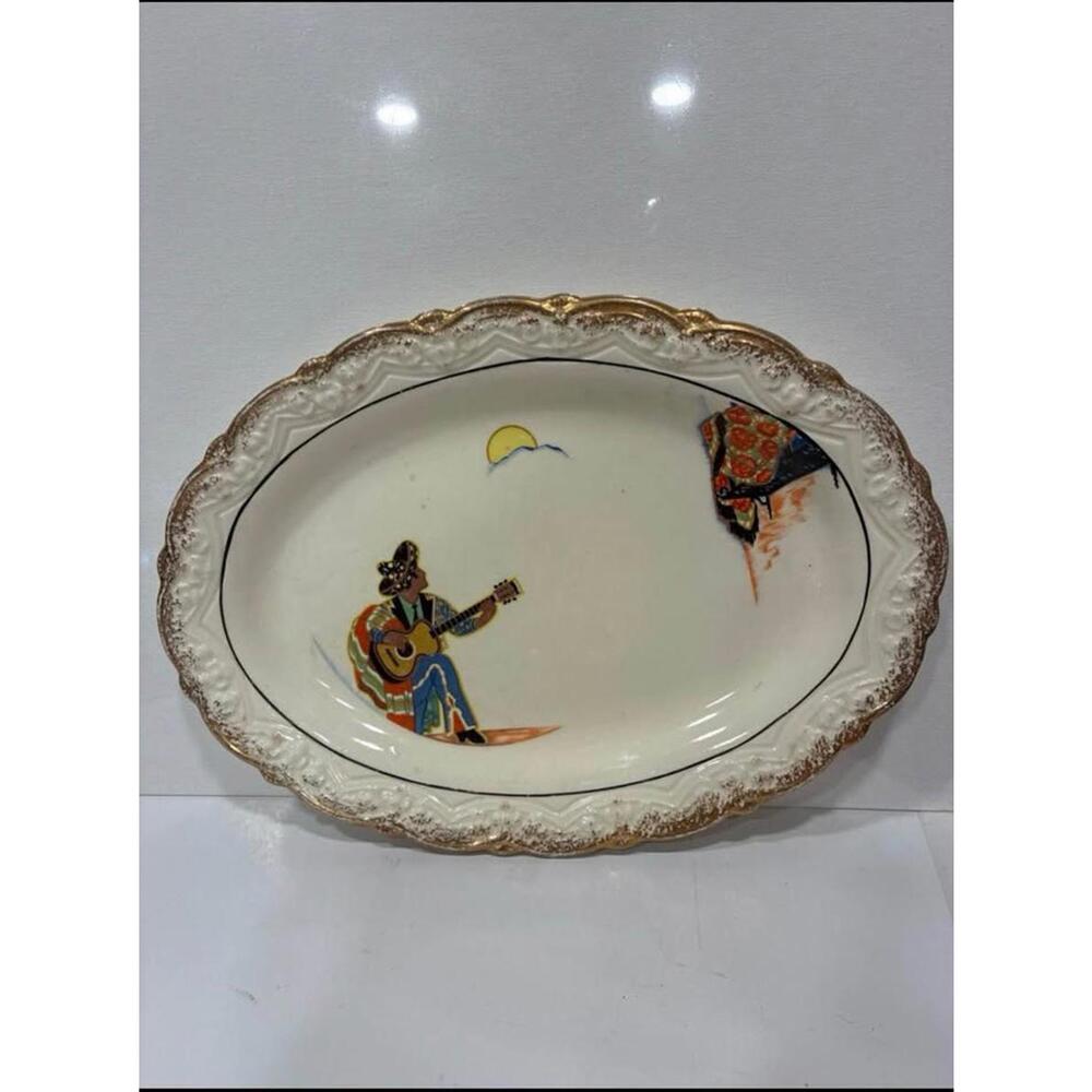 1930s Vernon Kilns pottery oval platter in the "Romeo and Juliet" pattern